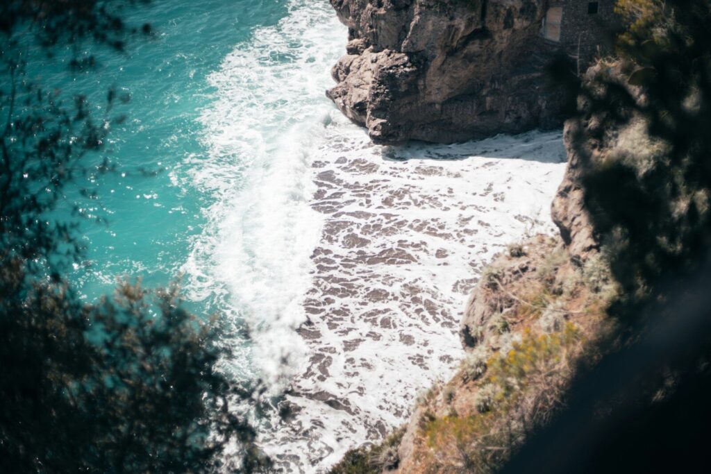 a view of the ocean from a cliff